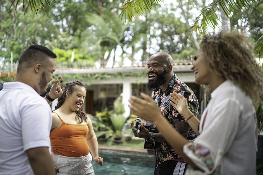 Friends dancing and enjoying music time at home